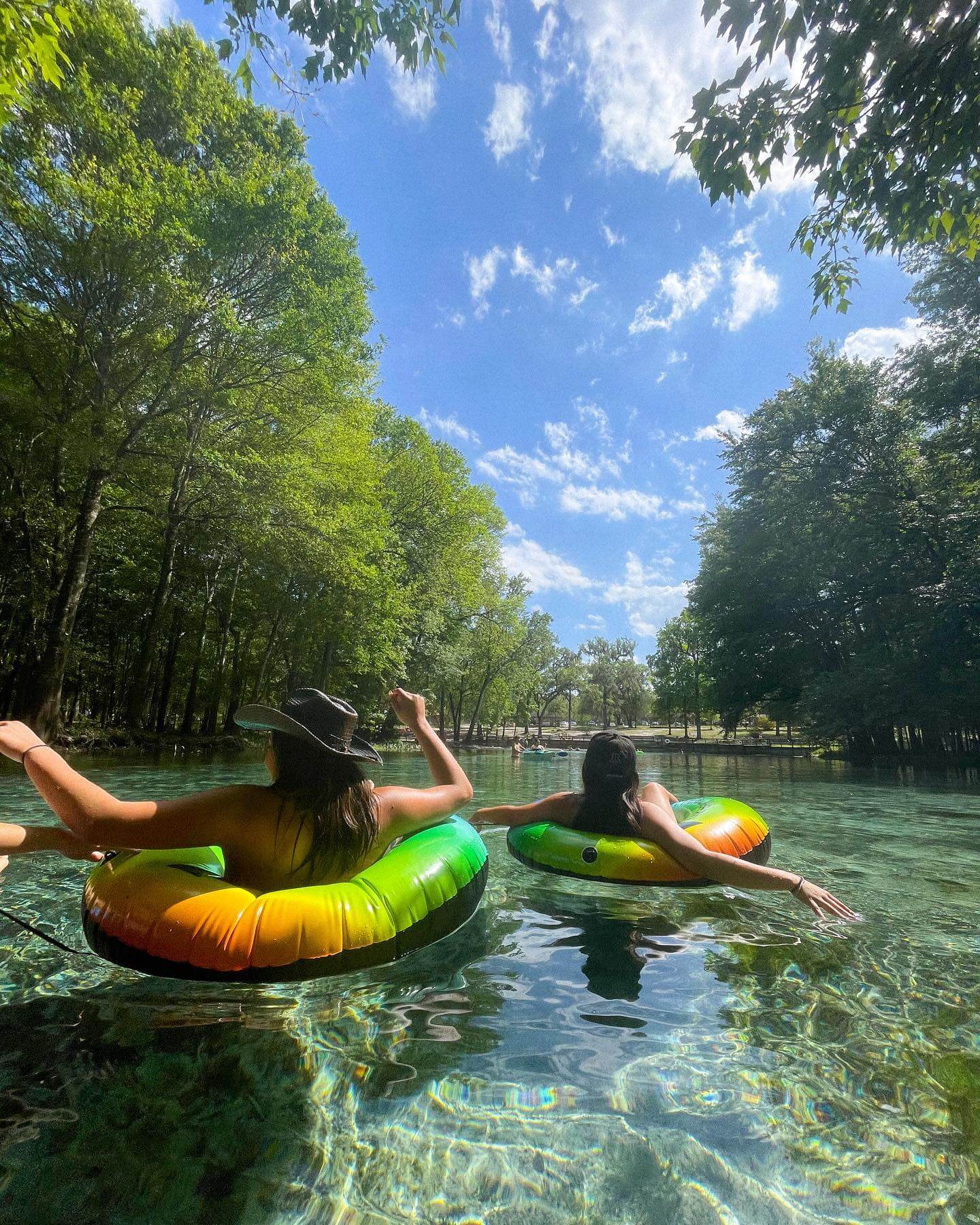 people floating in tubes at Gilchrist Blue Springs State Park