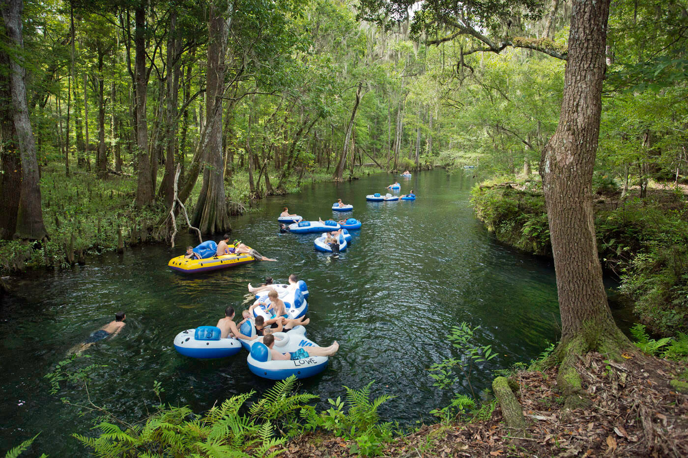 people floating in tubes at ichetucknee springs