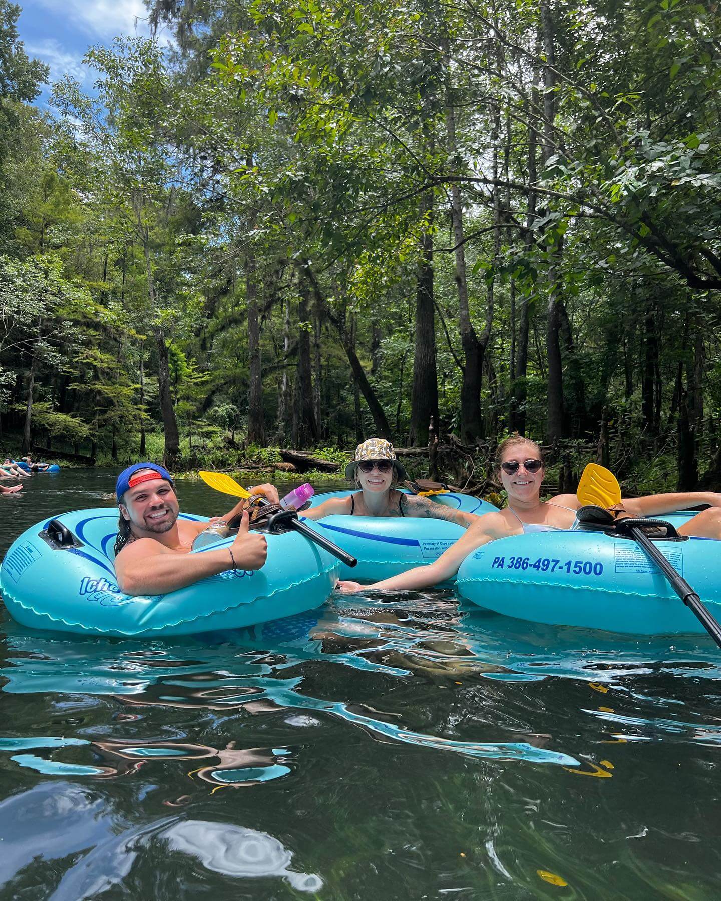three people floating in tubes at Ichetucknee Springs