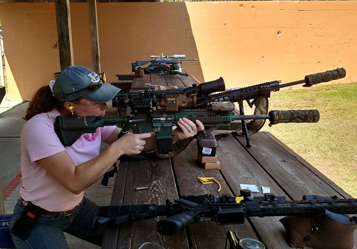 person practicing at shooting range
